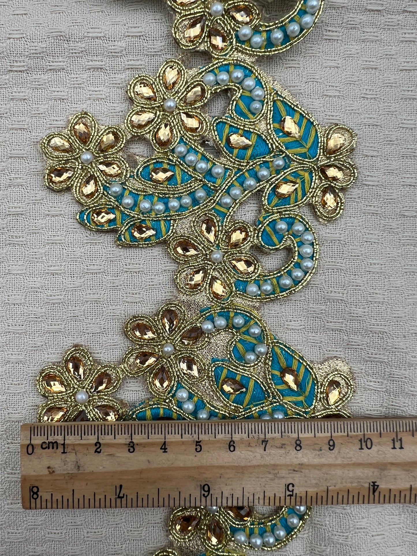 Galon oriental or et bleu à motifs floraux