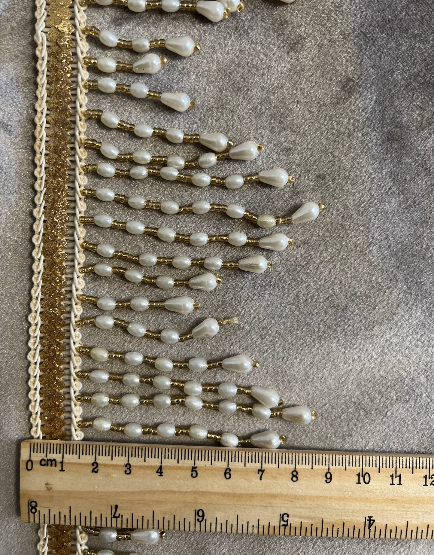 Galon doré à franges perlées