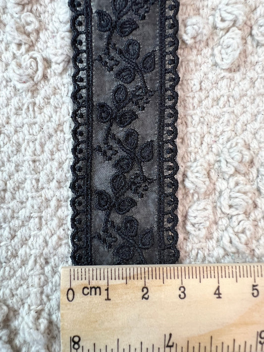 Galon noir uni tige fleurie