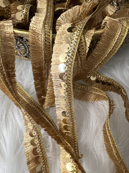 Galon sequin à franges rose doré